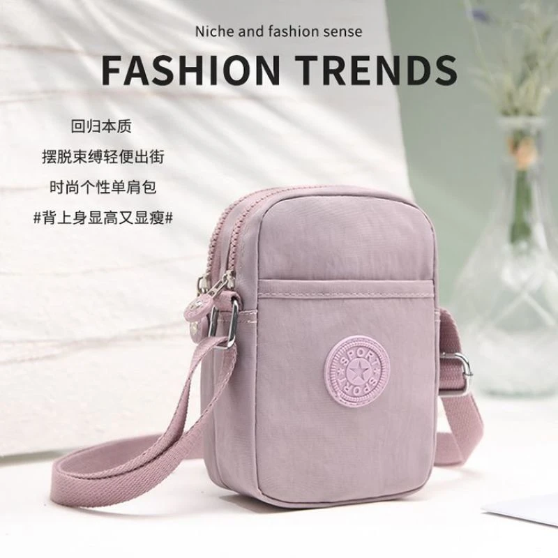 新款女士迷你斜挎小包包帆布包手机零钱包单肩小包时尚竖款小布包