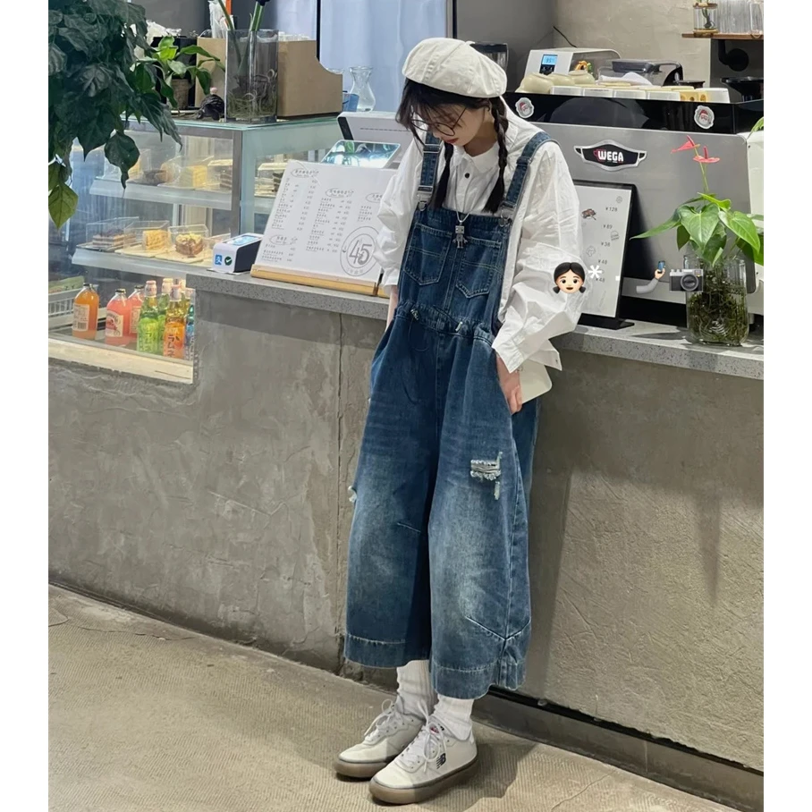 蓝色背带裤女2025夏季新款欧货工装八分阔腿裤宽松休闲牛仔连体裤