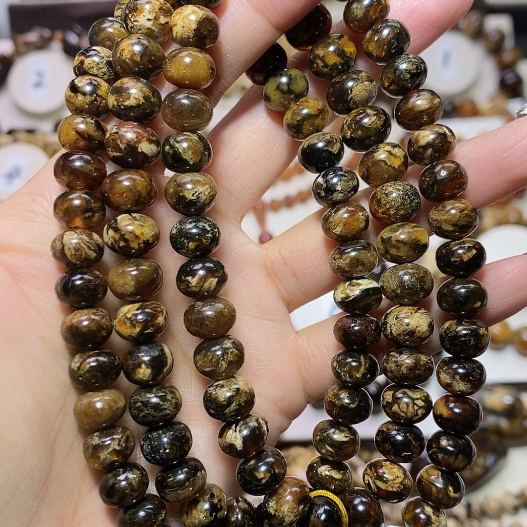 *****琥珀未镶嵌裸石熊猫花9+