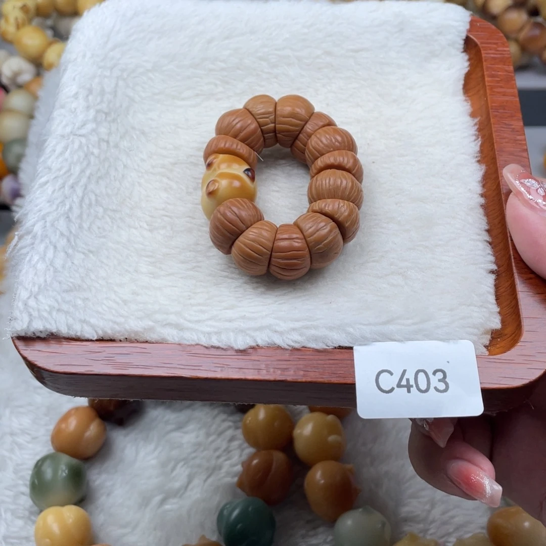 菩提根/象牙果吊坠WC403凤羽手捻一串随机15mm