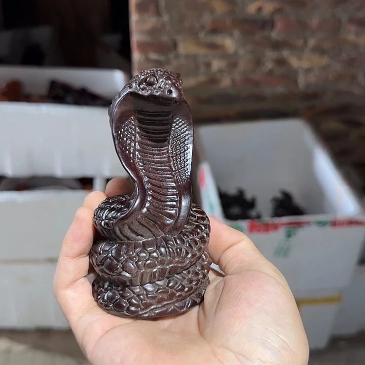 木黑檀木12金钱蛇一只