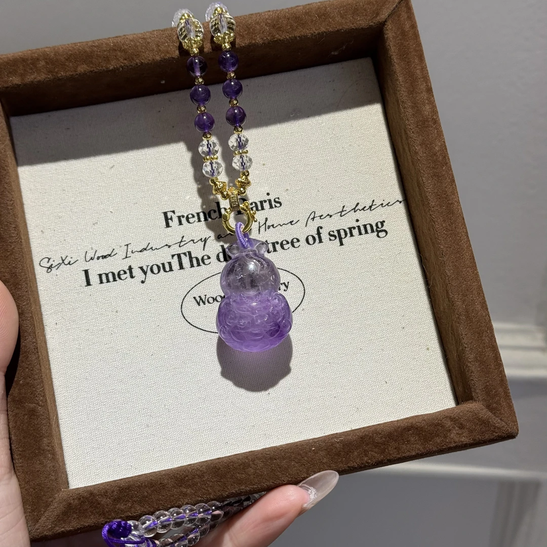 h010天然紫水晶九尾狐吊坠