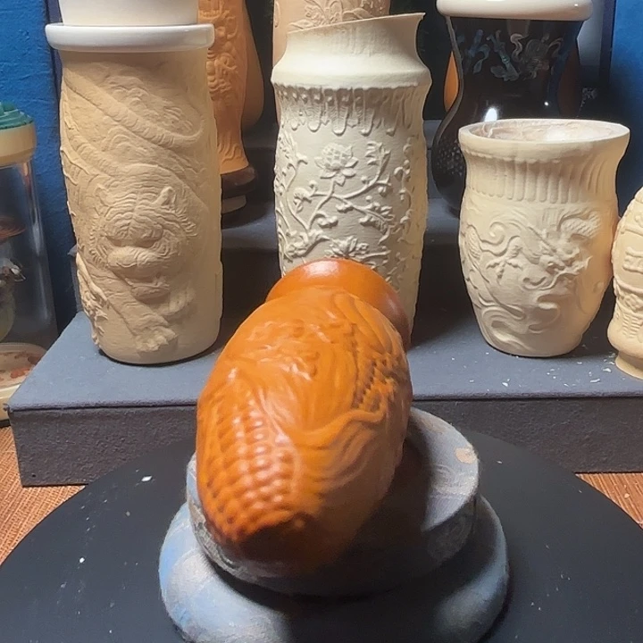 小心翼翼把它拿下来吧笑