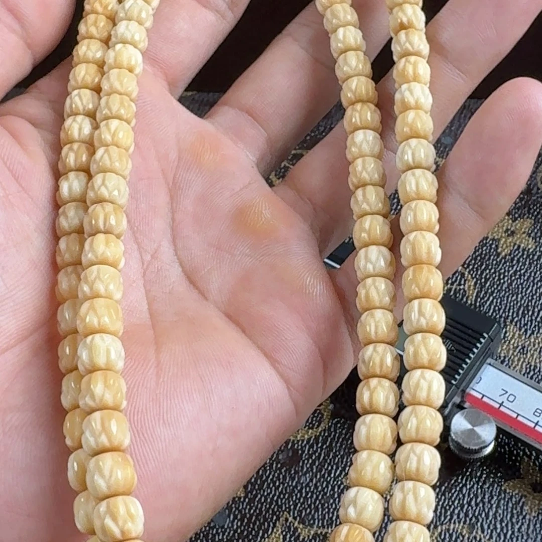 龙眼菩提吊坠林**谱手串