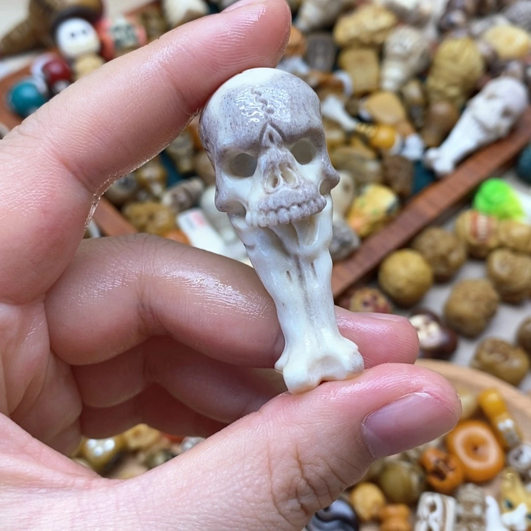 驼骨其他鹿角紫皮骷髅手把件