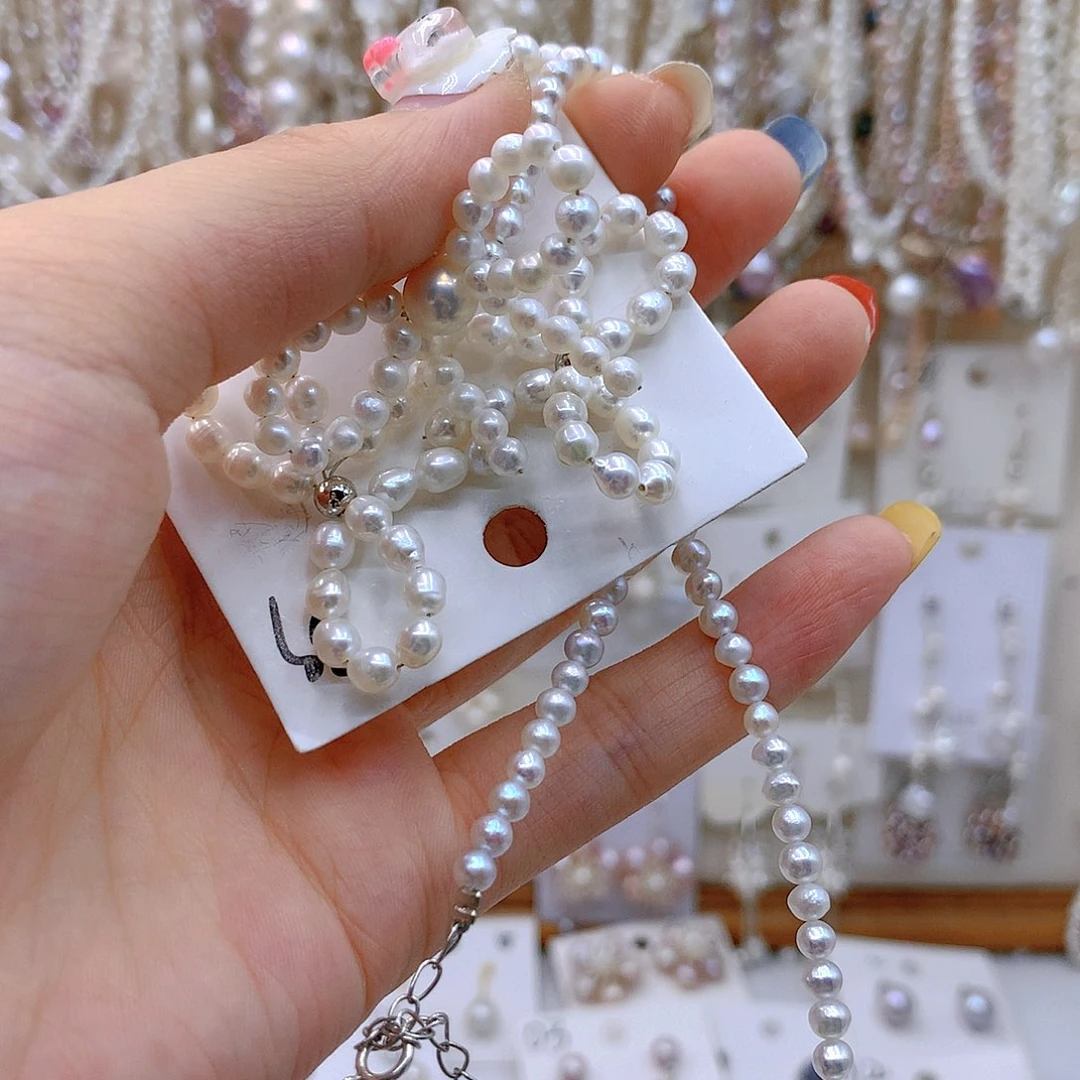 银S925镶嵌淡水珍珠发饰N****话