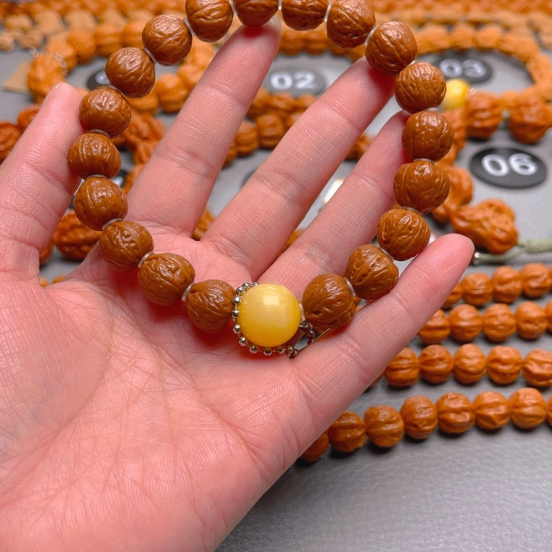 。***。文玩核桃吊坠核桃手串