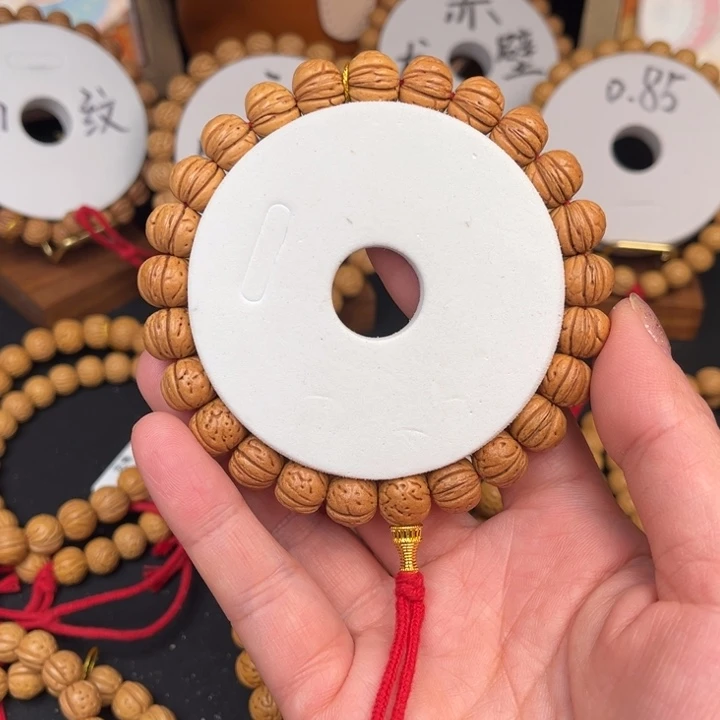 埃***.桃核手串无名边尺11.5抛光25颗尺寸误差0.5mm之间