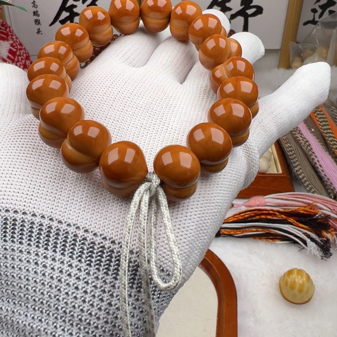 嘉***装猴头核桃手串大屁桃