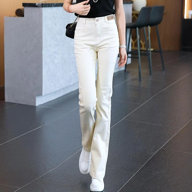 秋冬米白色修身提臀马蹄裤女2025年新款九分微喇牛仔小个子喇叭裤