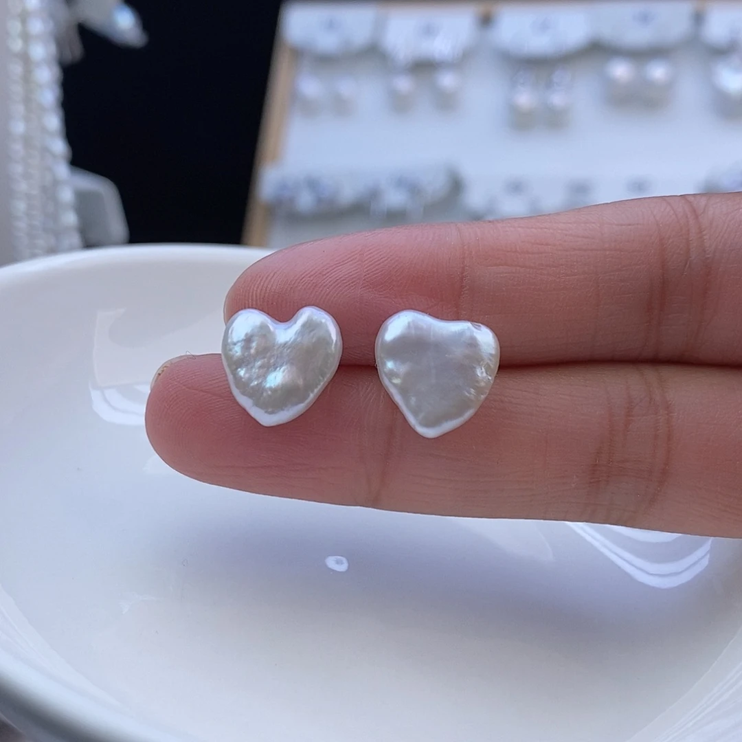 牛****耳饰银S925镶嵌淡水珍珠