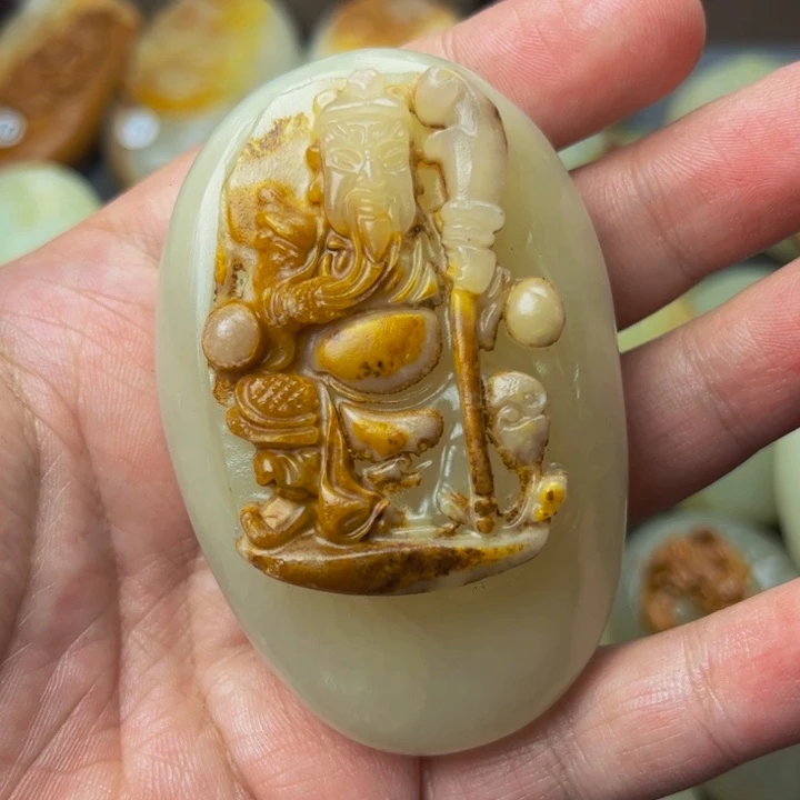 石材方解石手把件关公