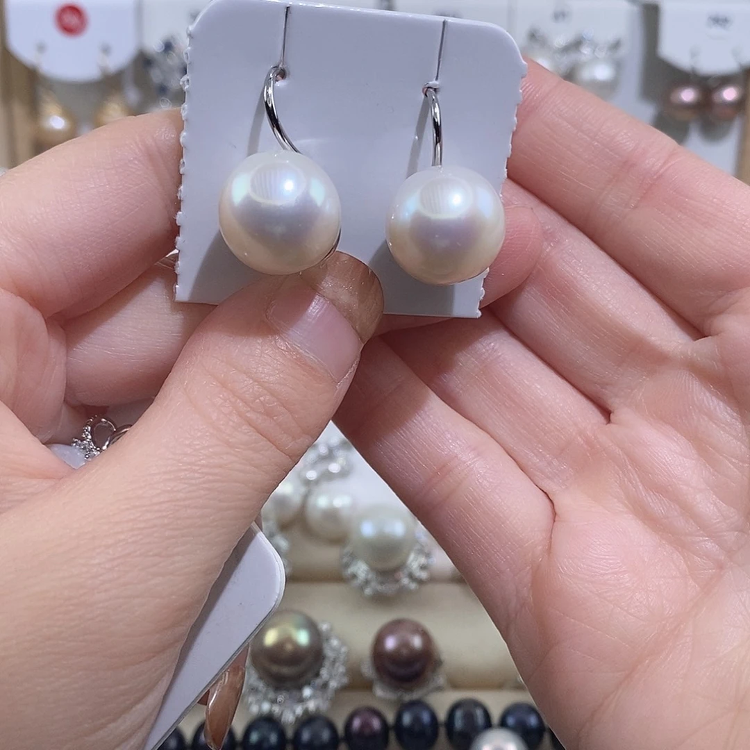 银S925镶嵌耳饰淡水珍珠w14有大的瑕疵