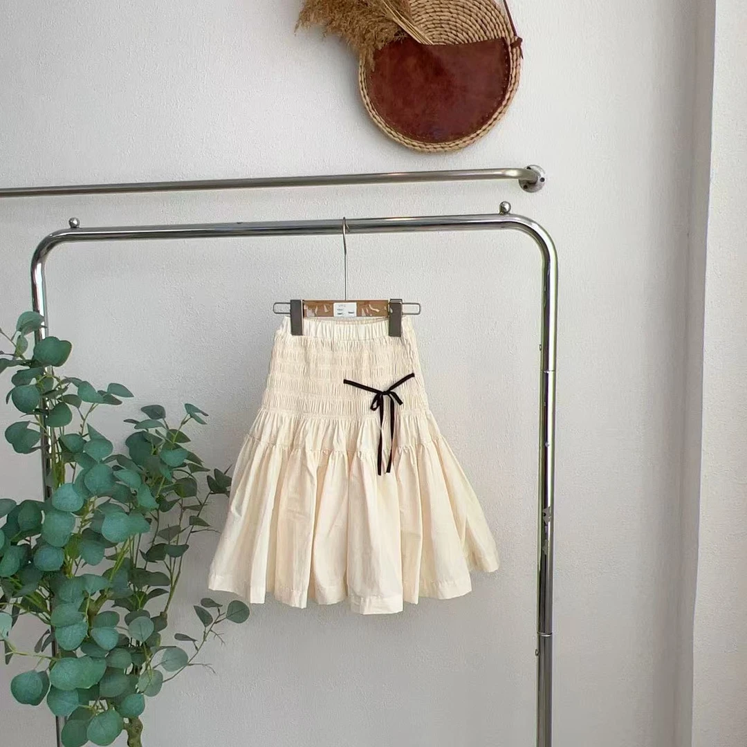 3610而杏色半身裙子