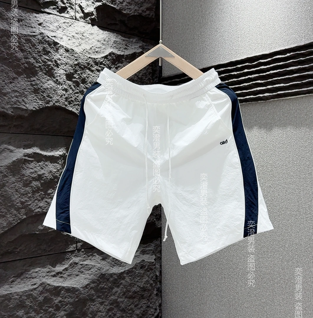 2025夏季新款潮流时尚百搭设计感拼接色透气短裤77886