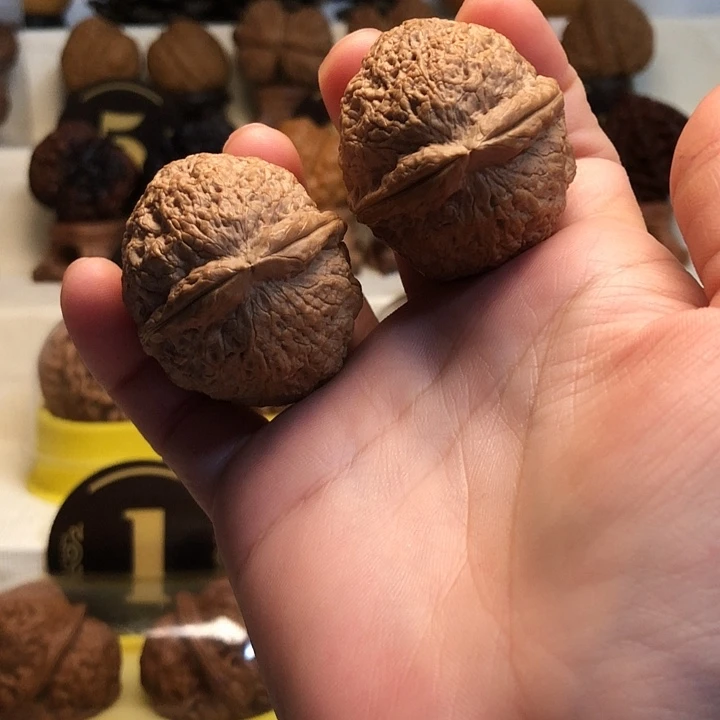 她***。桃核吊坠云南铁核桃