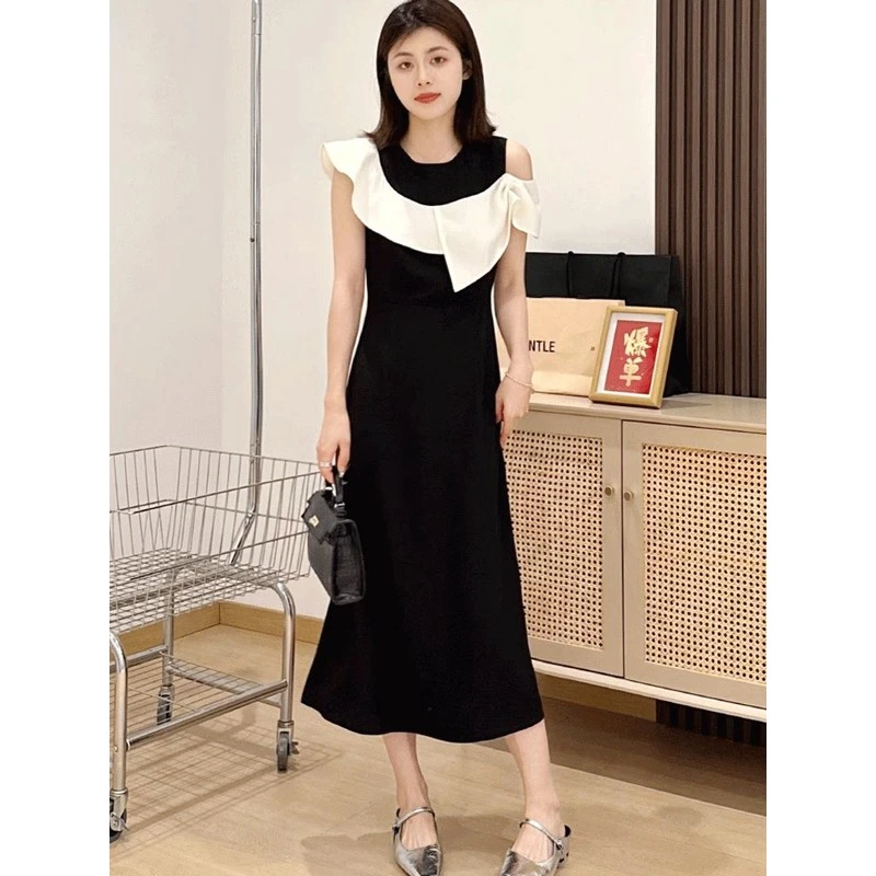 法式赫本风无袖连衣裙女夏2025新款今年流行爆款荷叶边露肩小黑裙