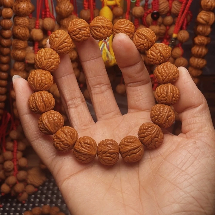 浮***梦木质类龙纹桃枭挂件