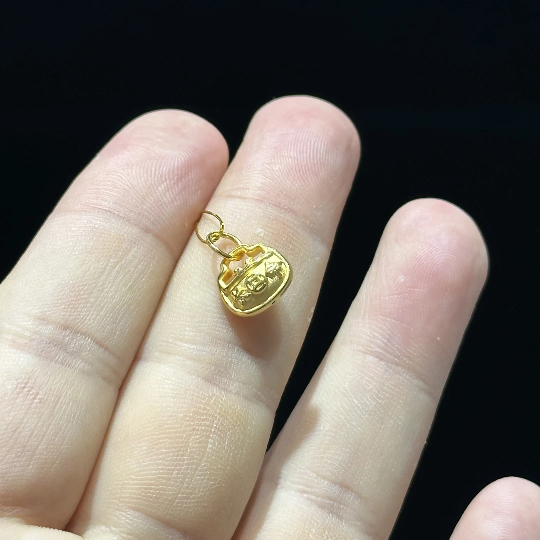 足金999 精品 长命富贵小锁滴流 0.811