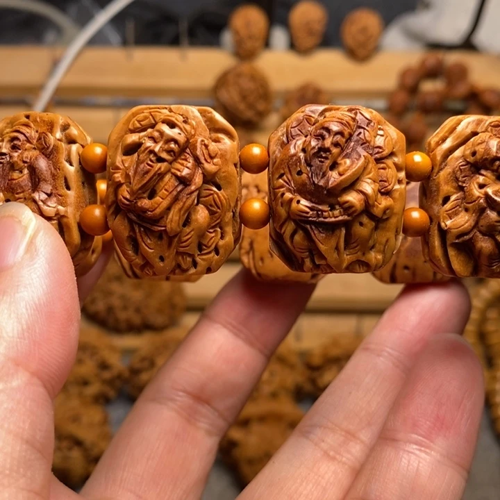 聚***多桃核手工雕刻财神手牌