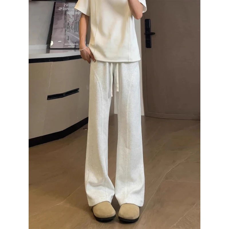 白灰色美式弯刀卫裤男秋季显高显腿长裤子垂感直筒斜切休闲微喇裤