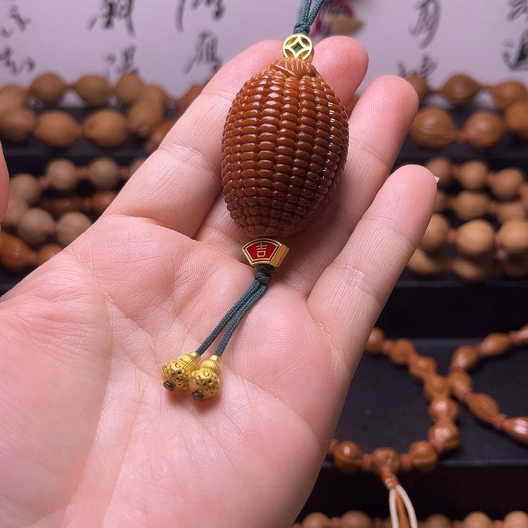 吊坠橄榄核刚好玉见你，发财君