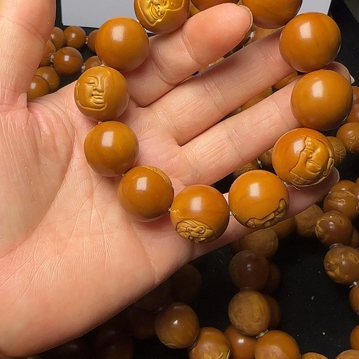 噜***.橄榄核雕刻手串一念