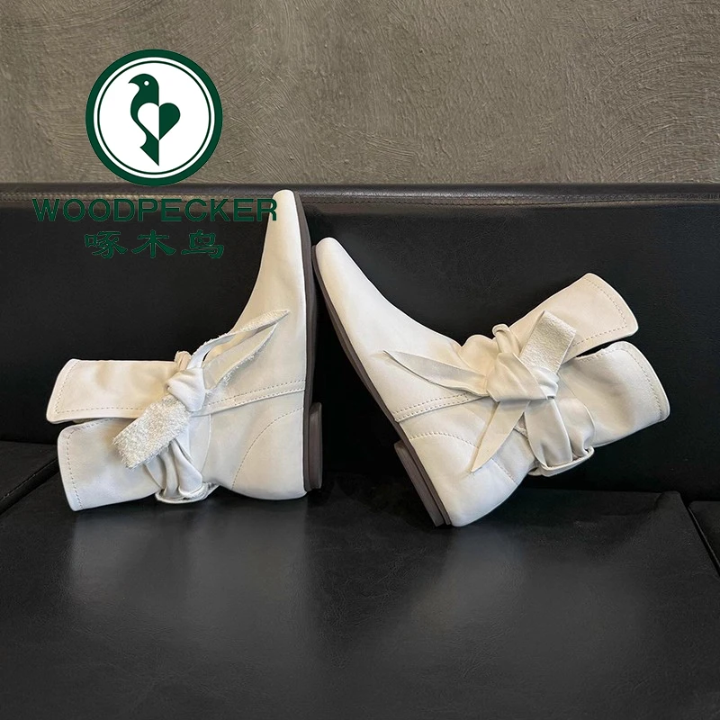 啄木鸟白色切尔西靴女新款蝴蝶结平底方头短靴复古软皮显瘦西部靴