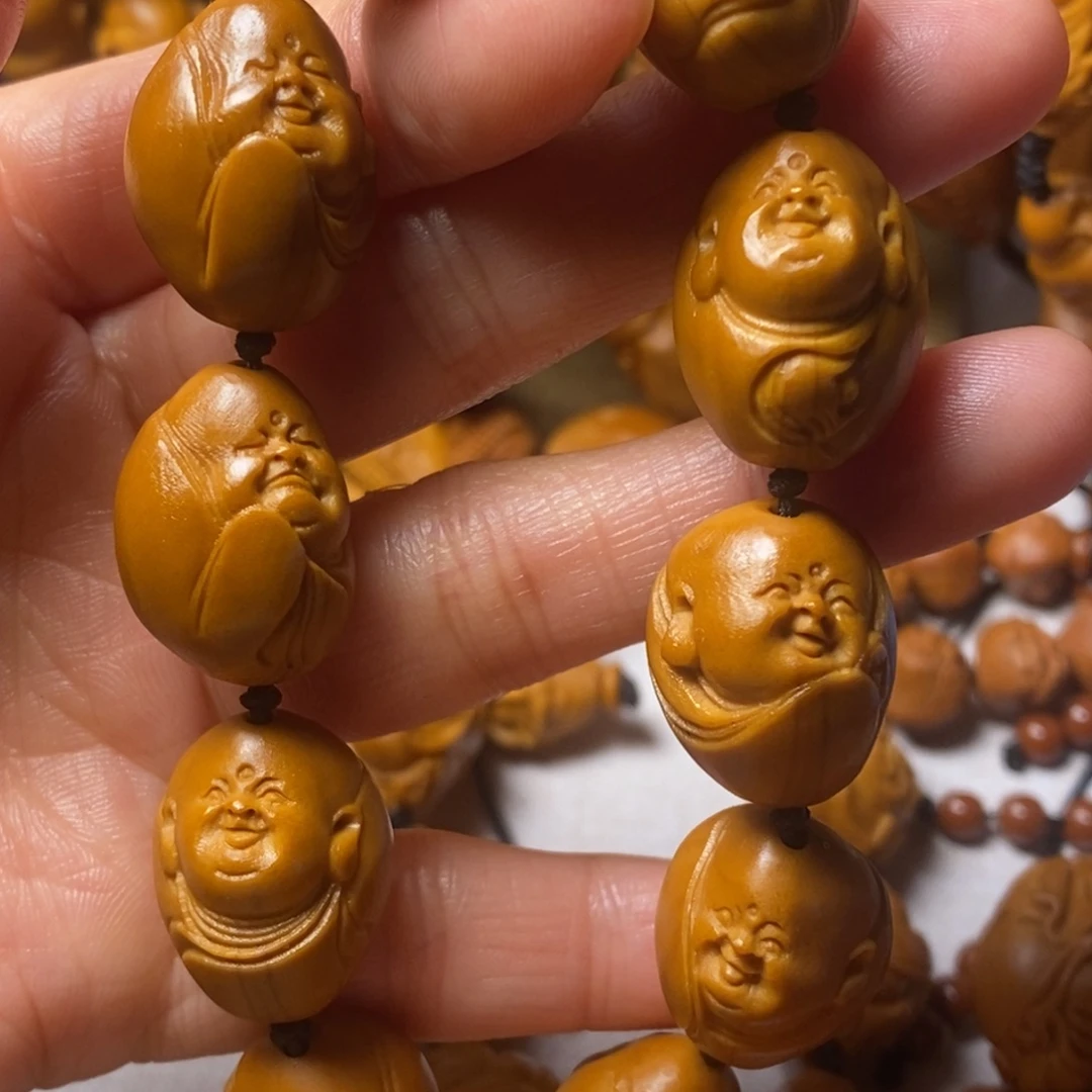 扬***它手串/手链橄榄核十小弥勒