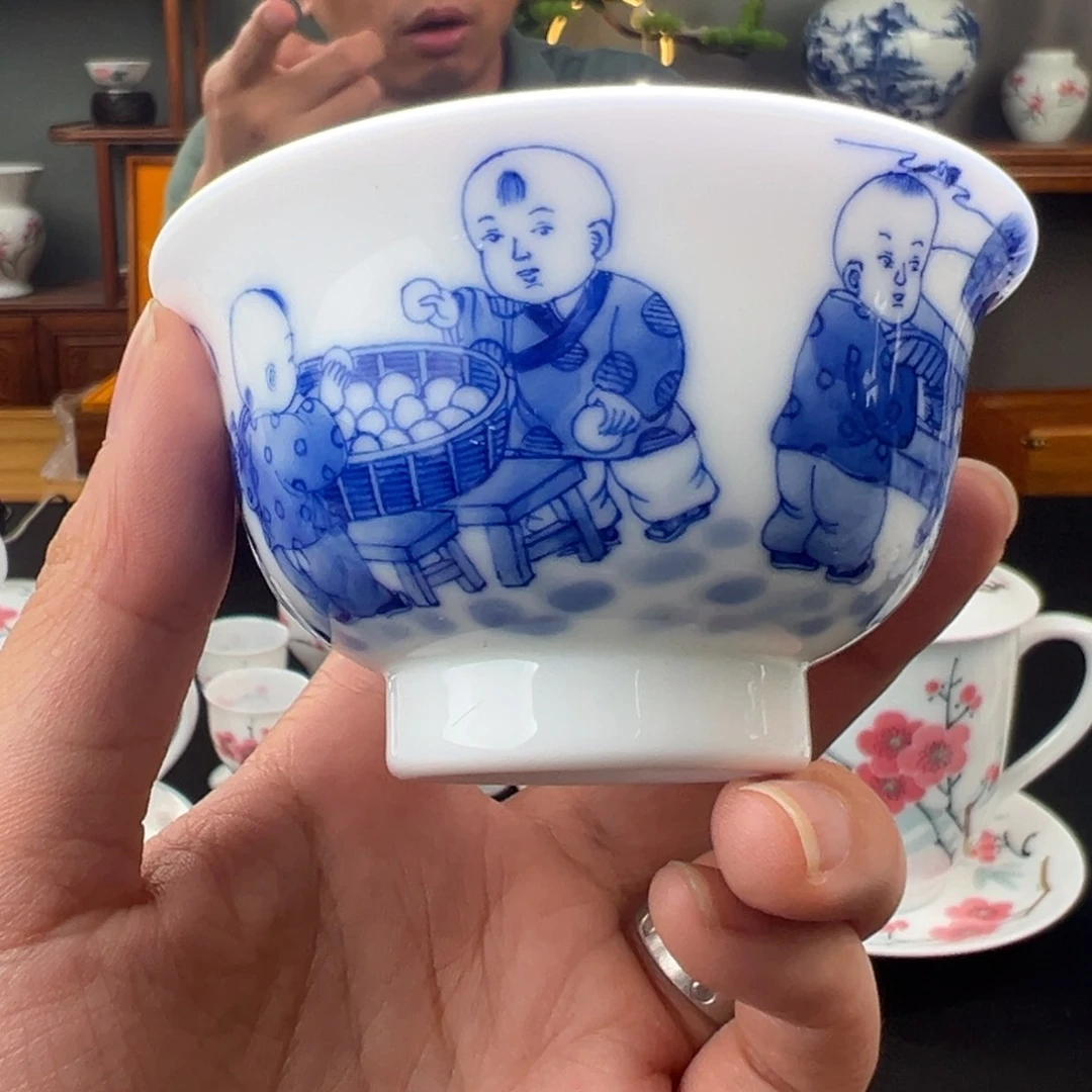 柴窑滑石子童趣蒸蒸日上压手杯