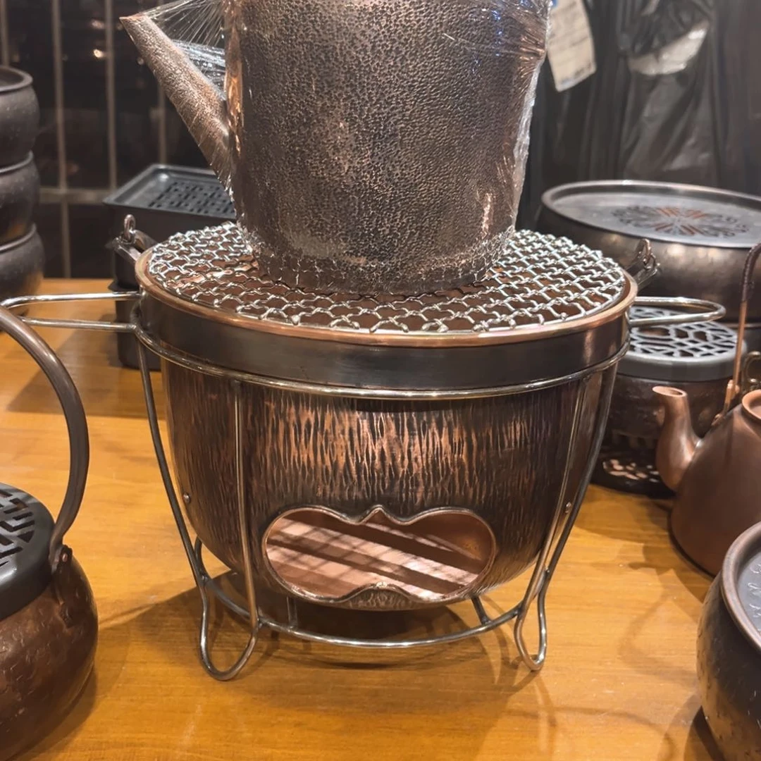 老师傅蓝色布提梁飞天壶手工锻打工艺