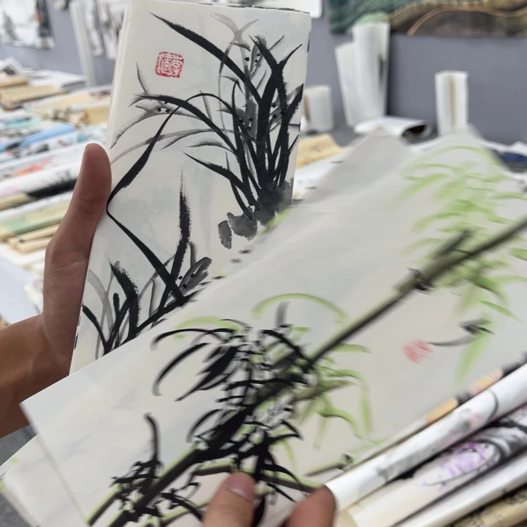 国画卖字画的小男孩