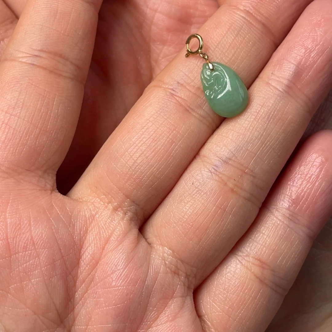 瑛***子翡翠18K金镶嵌颈饰钱袋