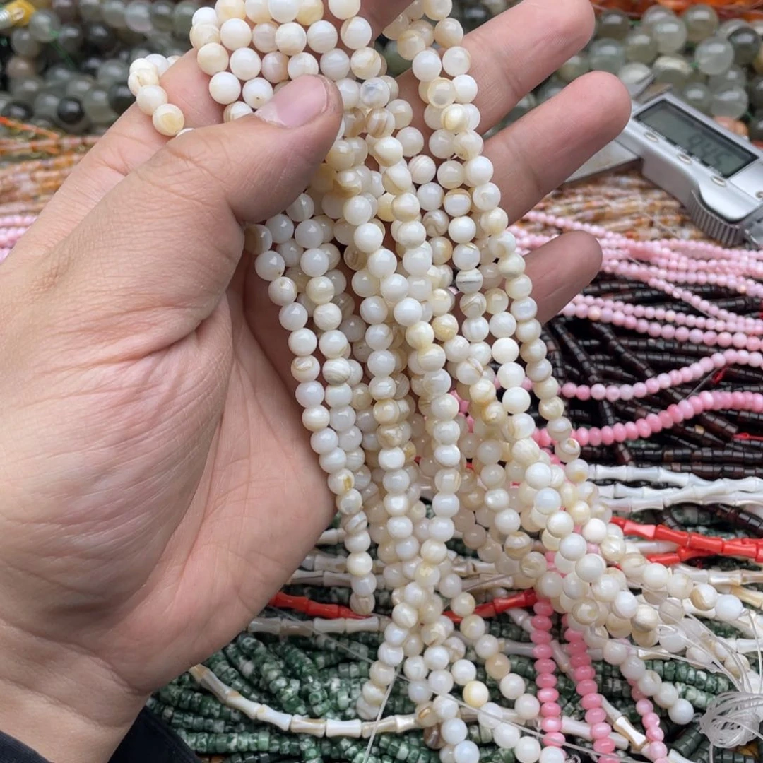 玛瑙/玉髓珠宝半成品未镶嵌一条装5.9mm淡水贝圆珠