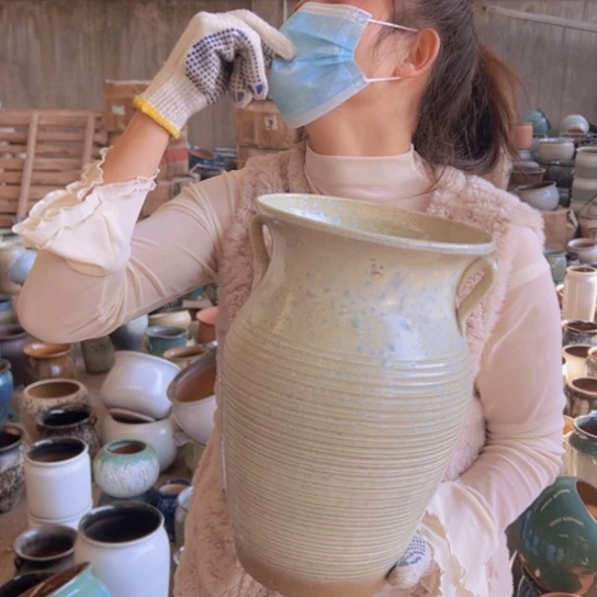 紫砂花盆高32口20。