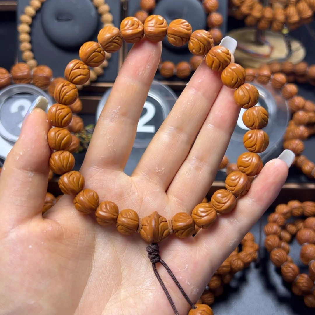 桃核手串2****车野生玉龙脊11