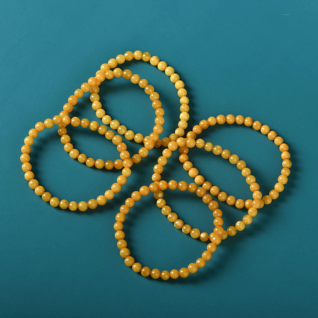 蜜蜡老料鹅蛋黄0.6单圈手链（多样性发其一）