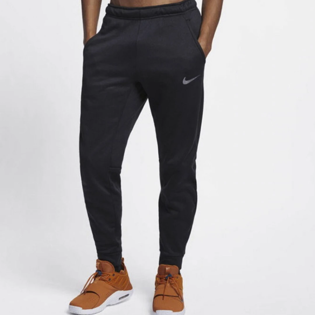 Nike/耐克男子加绒保暖外穿速干运动训练束腿长裤