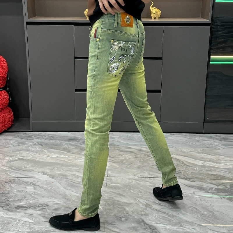 欧货轻奢潮牌牛仔裤男春夏新款口袋印花小脚裤青年痞帅修身长裤子