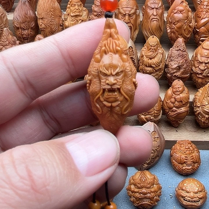 橄榄核吊坠19龙佛手