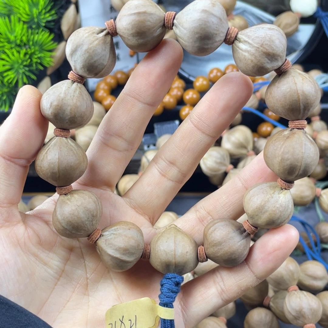 七***橄榄核吊坠21x21老料