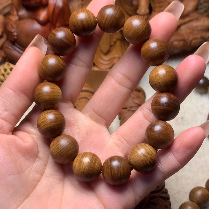 檀香木其他老山檀香手把件瑕疵