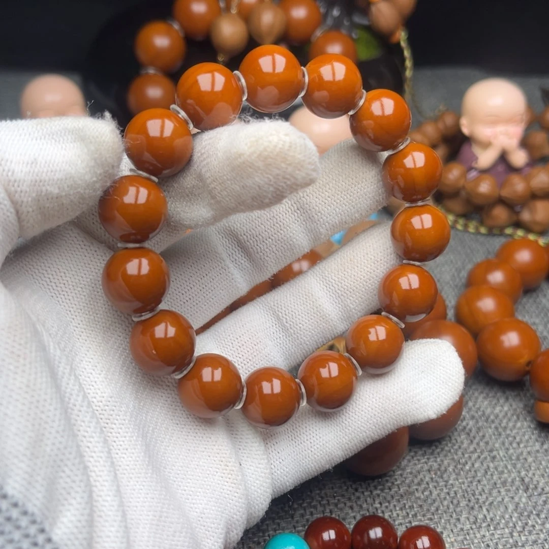 橄榄核手串/手链隔***。1.4精品中孔鸡血红