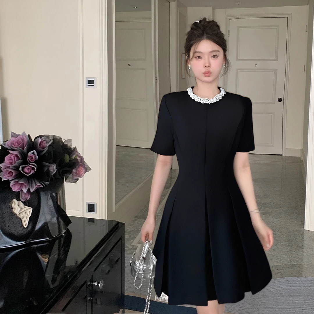 A气质黑色连衣裙女2025春季新款法式收腰显瘦通勤a字短裙D0855