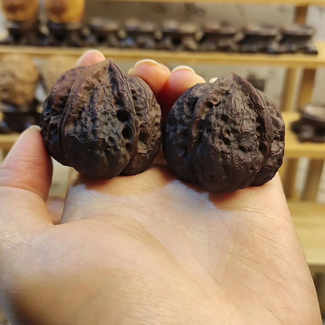 文玩核桃吊坠云南野生铁核桃元宝三棱佛肚