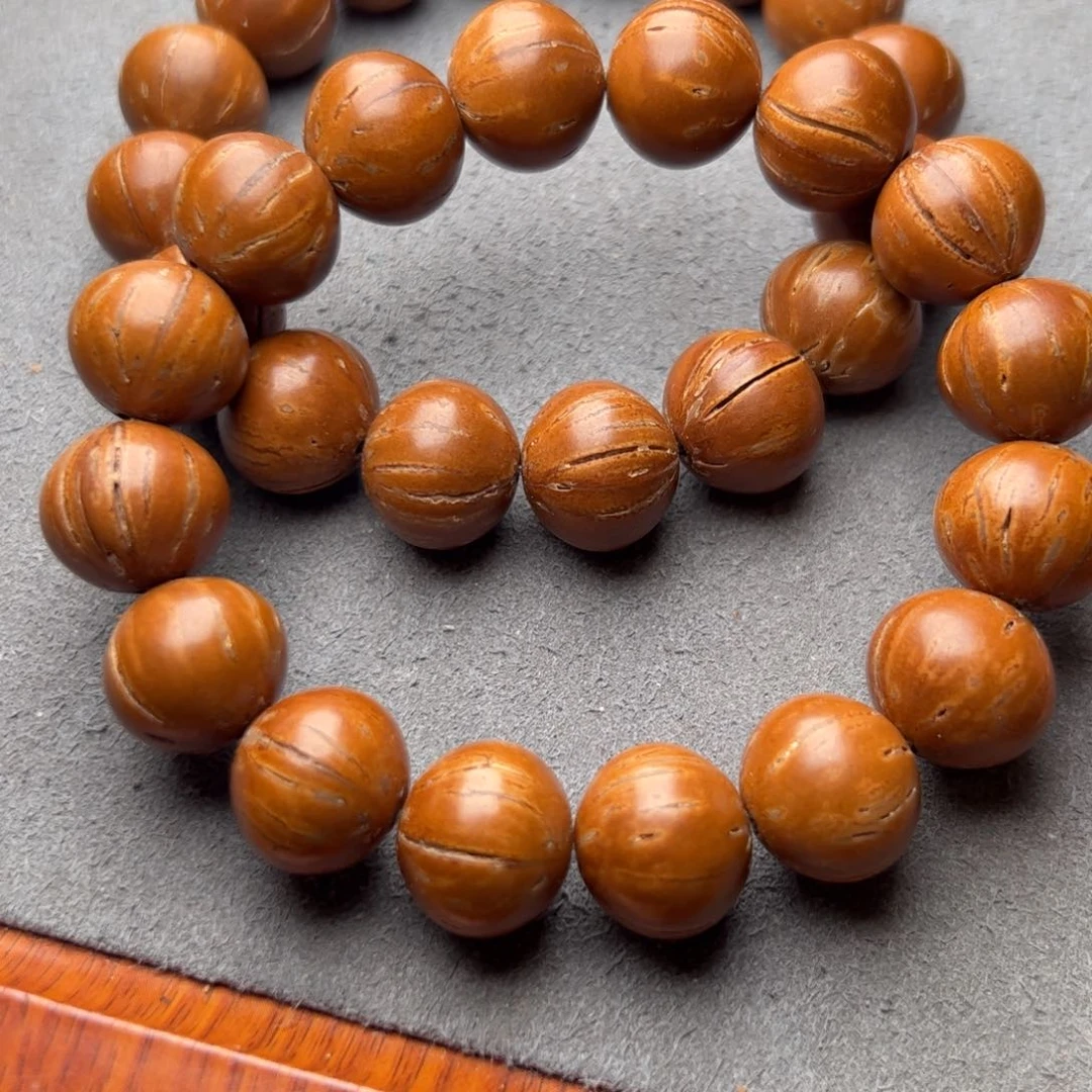 桃核手串红魔光珠尺寸16左右