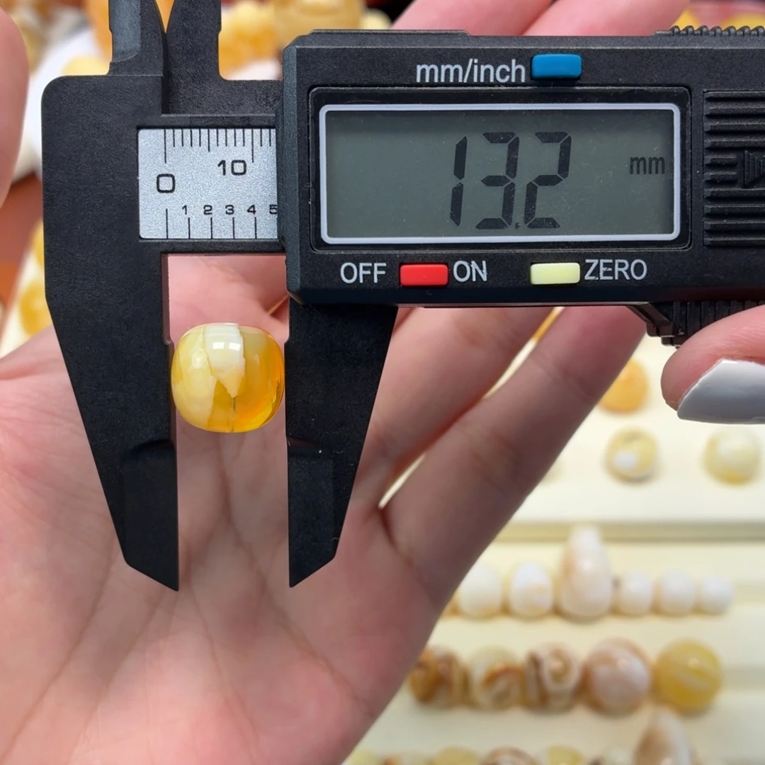 琥珀未镶嵌珠宝奇石焦皮金橘白溶洞老型13mm