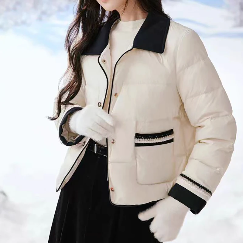 时尚流行高级感撞色羽绒服2025冬季新款舒适百搭保暖上衣