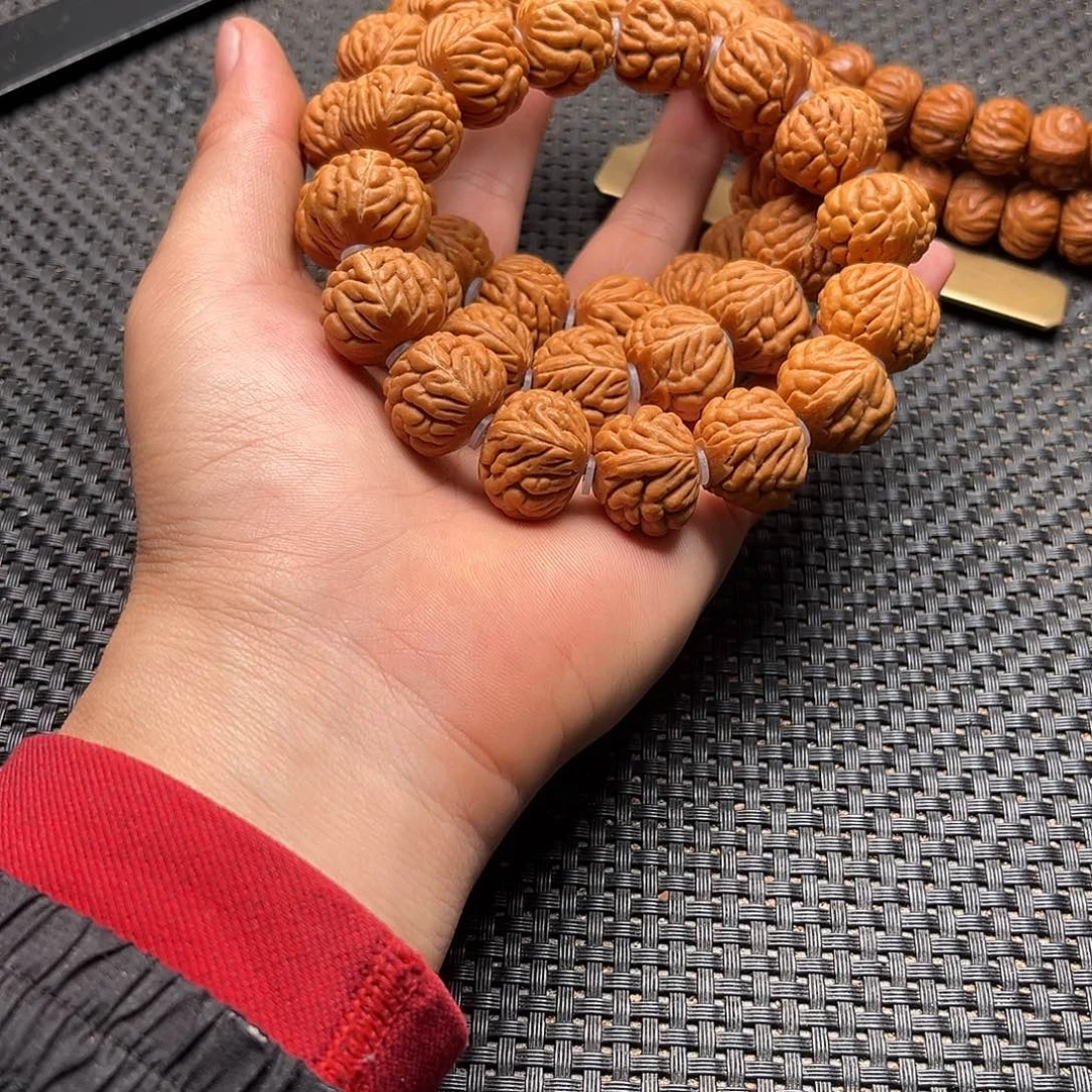 桃核吊坠八王龙手串