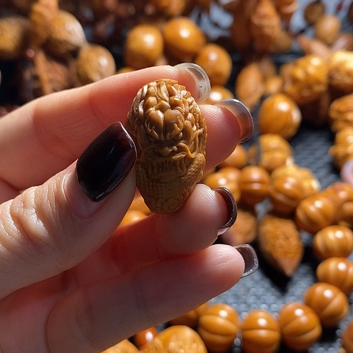 吊坠橄榄核清**酒龙三通